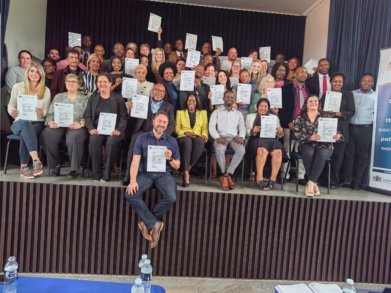EduQuest College community at a certificate ceremony